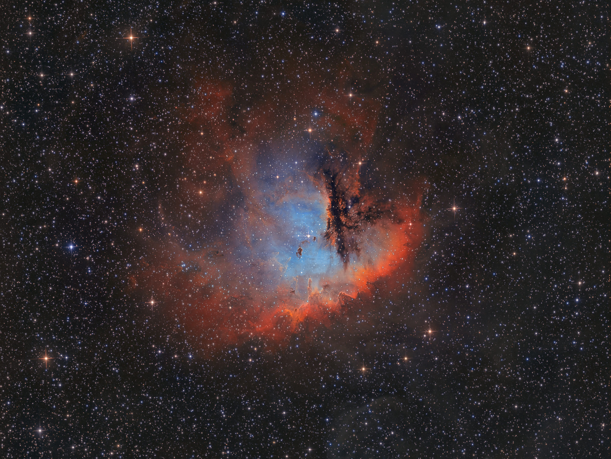 NGC 281 is an emission nebula in the constellation Cassiopeia. Also known as the Pacman Nebula because of its similarity to the well-known video
